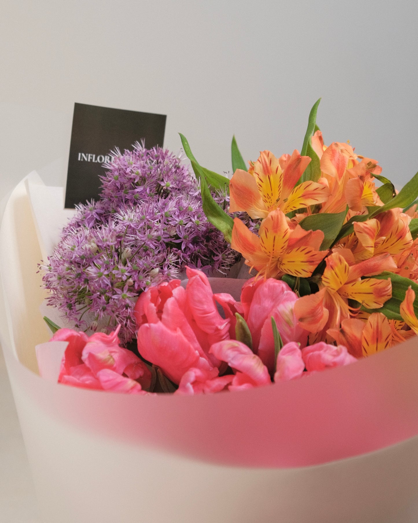Trio seasonal flower bundle featuring three curated flower varieties in a florist-selected colour palette for arranging at home