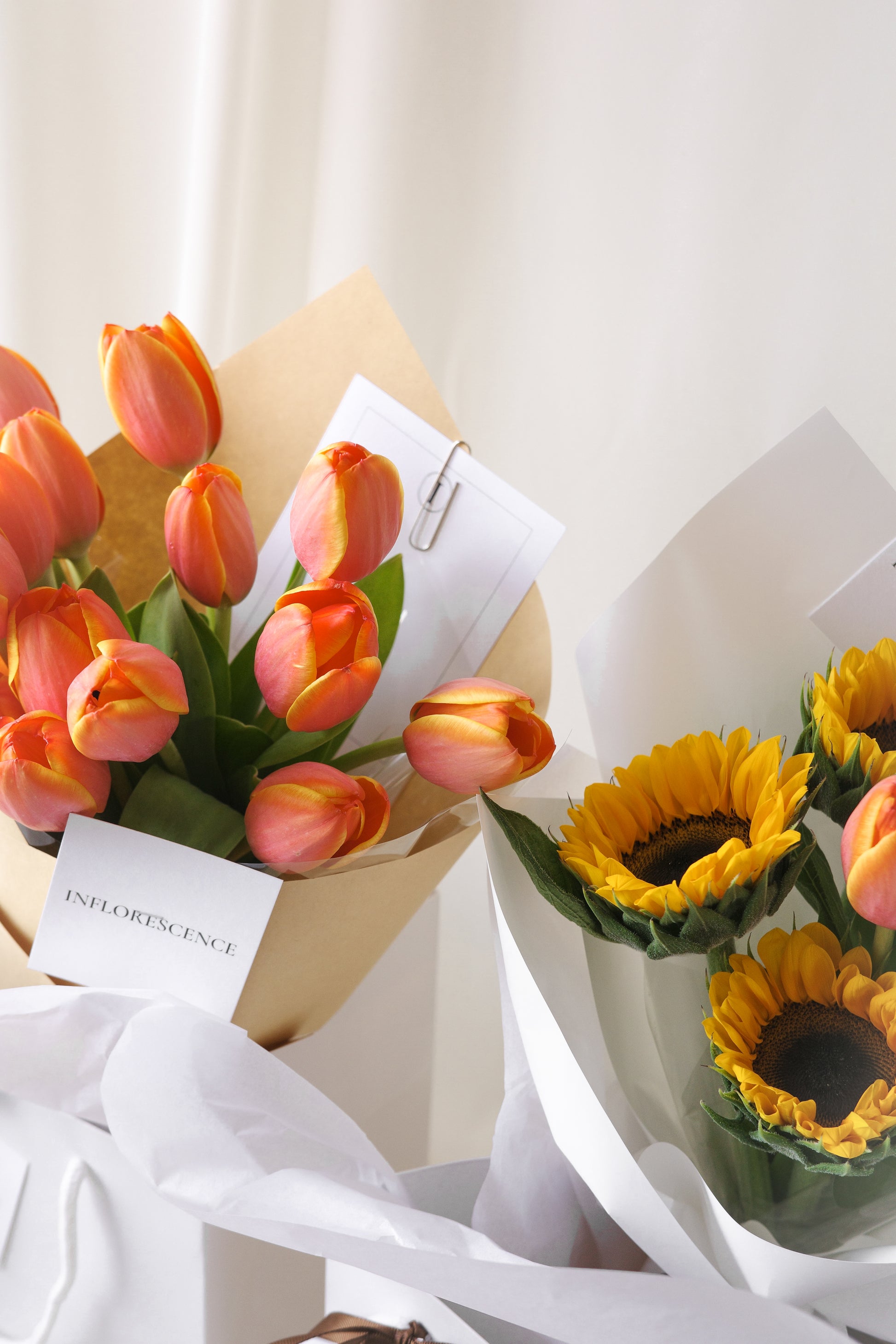 Fresh vibrant orange tulip bouquet arranged by Studio Inflorescence