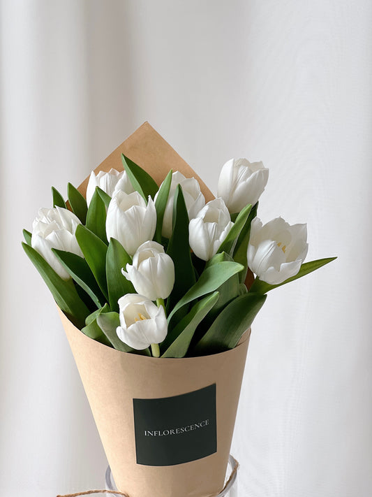 Fresh white tulip bouquet arranged by Studio Inflorescence
