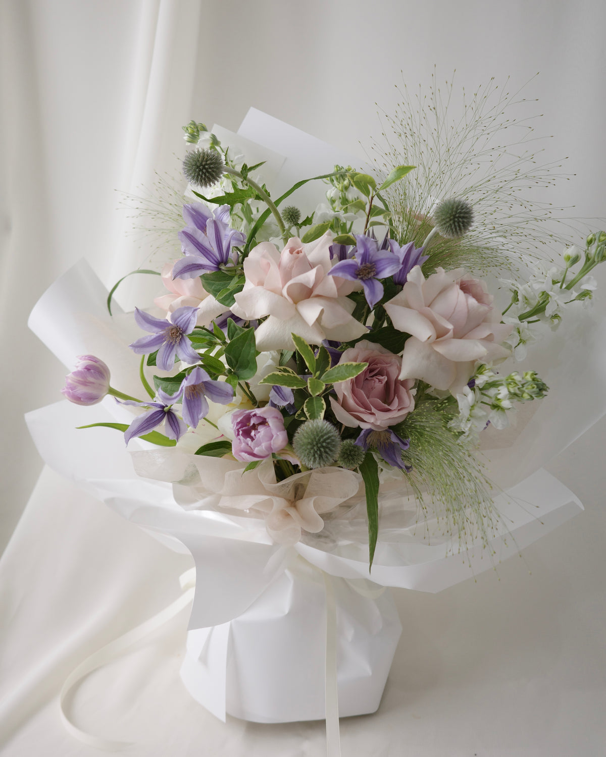 Lilac and blush flower bouquet with fresh green accents | Studio Inflorescence