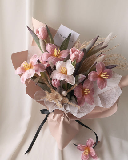 Brownie tulip bouquet with soft blush flowers and seasonal textures by Studio Inflorescence Singapore