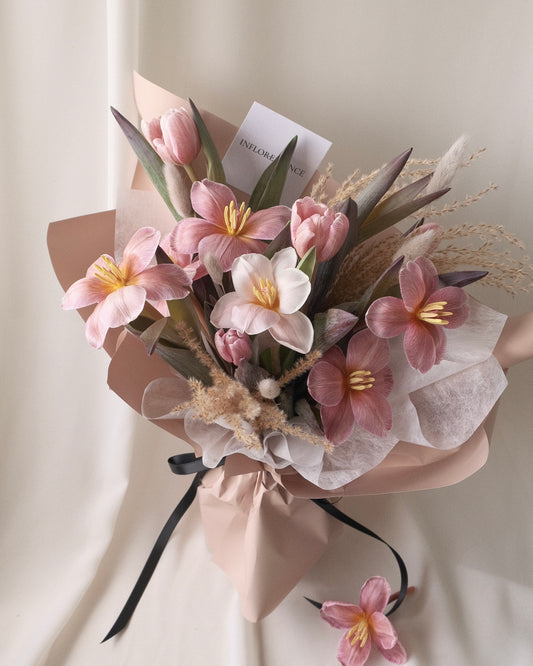 Brownie tulip bouquet with soft blush flowers and seasonal textures by Studio Inflorescence Singapore