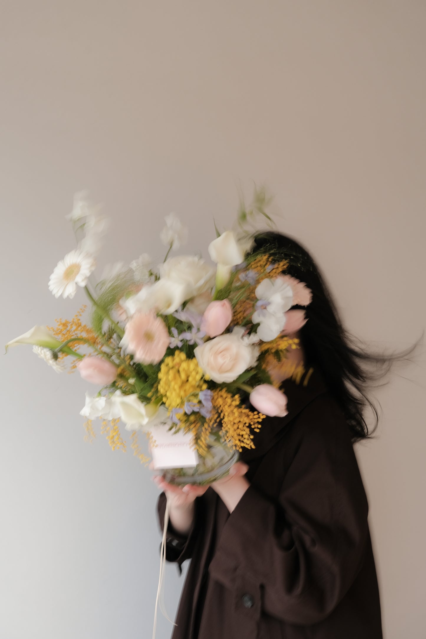 Valentine's Day. Soft blush and ivory floral arrangement with natural movement in a vase, Gentle Assembly