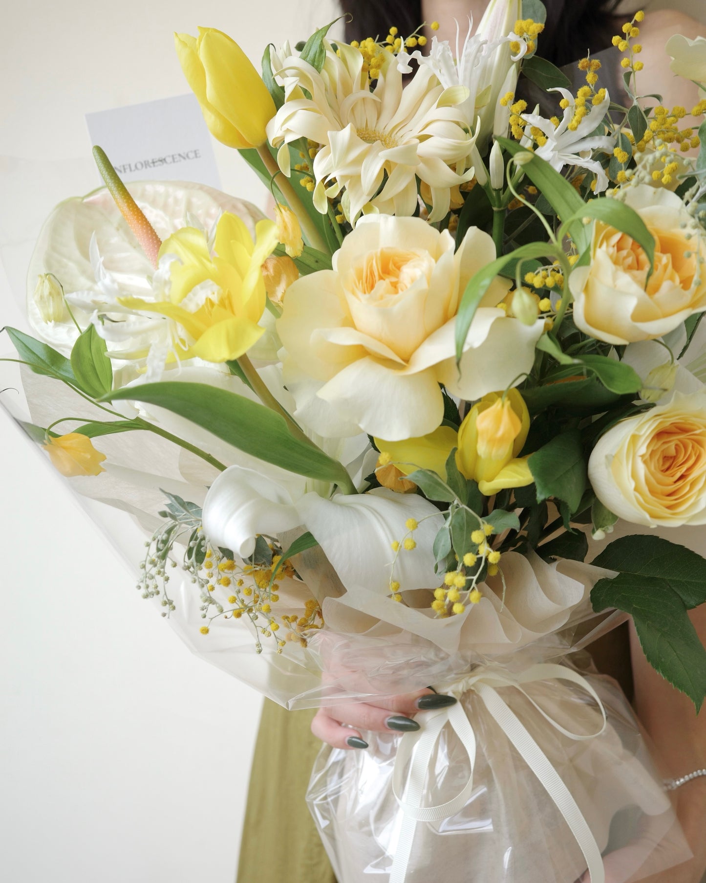 Premium yellow and white bouquet with tulips, roses, mimosa, and seasonal flowers by Studio Inflorescence Singapore