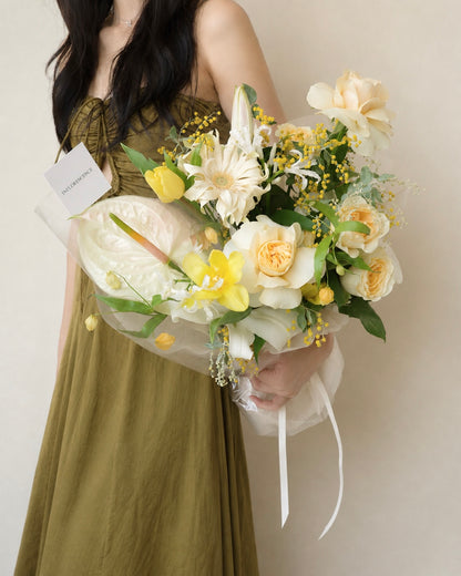 Premium yellow and white bouquet with tulips, roses, mimosa, and seasonal flowers by Studio Inflorescence Singapore