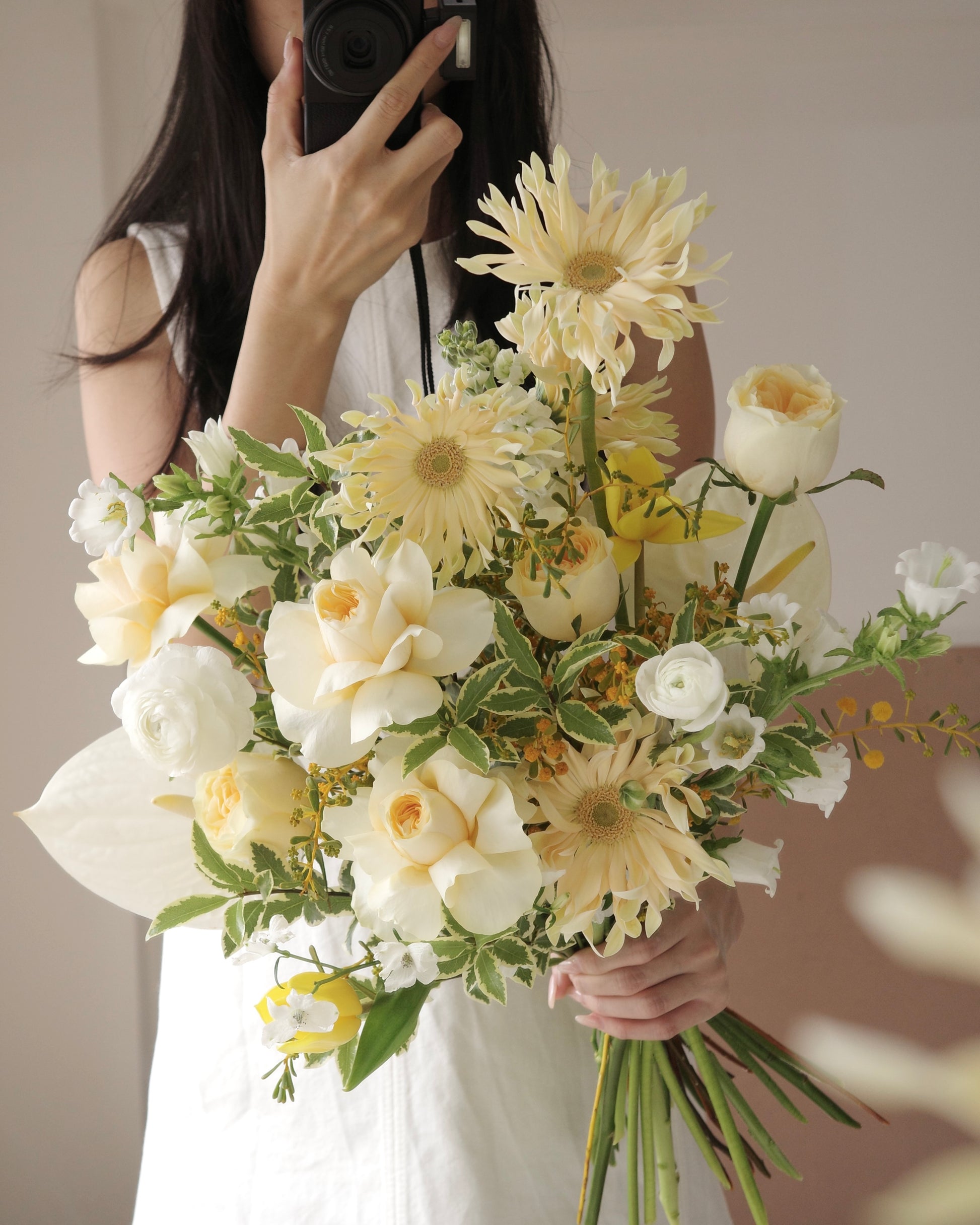 Premium yellow and white bouquet with tulips, roses, mimosa, and seasonal flowers by Studio Inflorescence Singapore