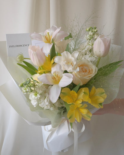 Seasonal bouquet in blush pink, butter yellow, white, and green by Studio Inflorescence Singapore