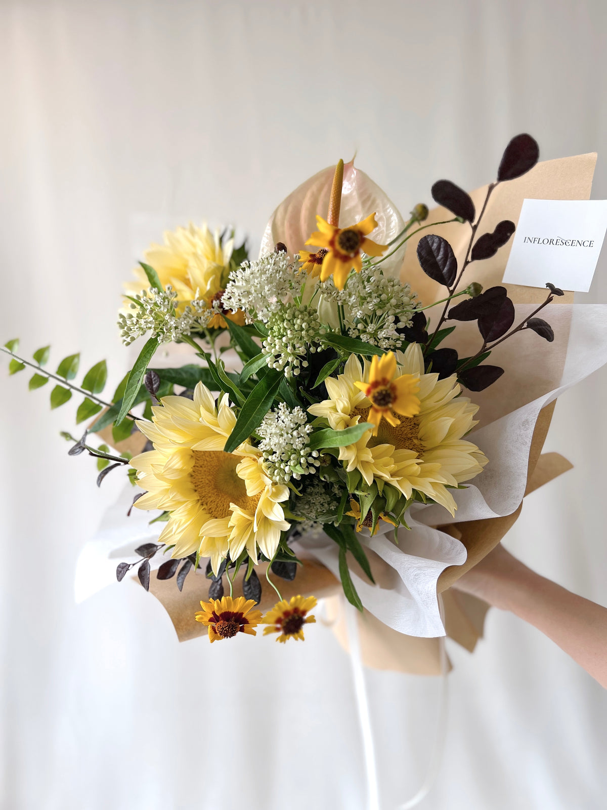 Sunflower bouquet with fresh seasonal flowers in a natural garden-inspired style by Studio Inflorescence Singapore