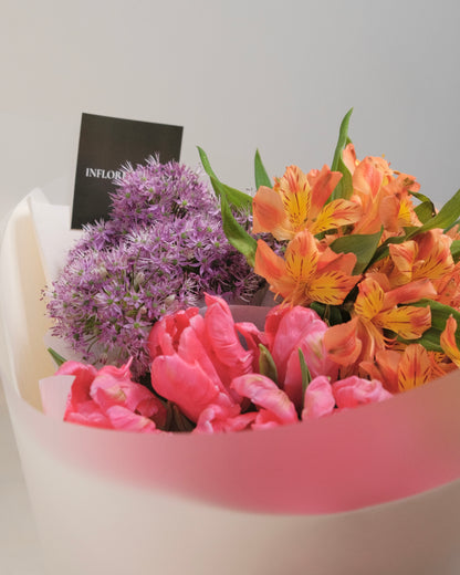 Trio seasonal flower bundle featuring three curated flower varieties in a florist-selected colour palette for arranging at home
