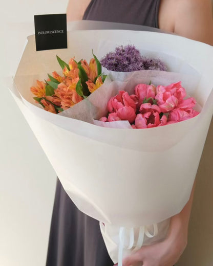 Trio seasonal flower bundle featuring three curated flower varieties in a florist-selected colour palette for arranging at home