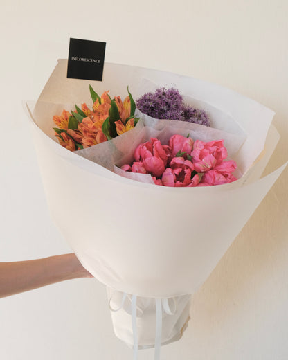 Trio seasonal flower bundle featuring three curated flower varieties in a florist-selected colour palette for arranging at home