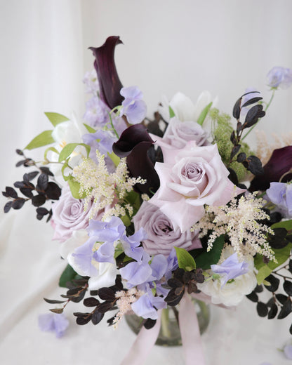 Romantic English garden inspired vase arrangement with roses and calla lilies by Studio Inflorescence Singapore