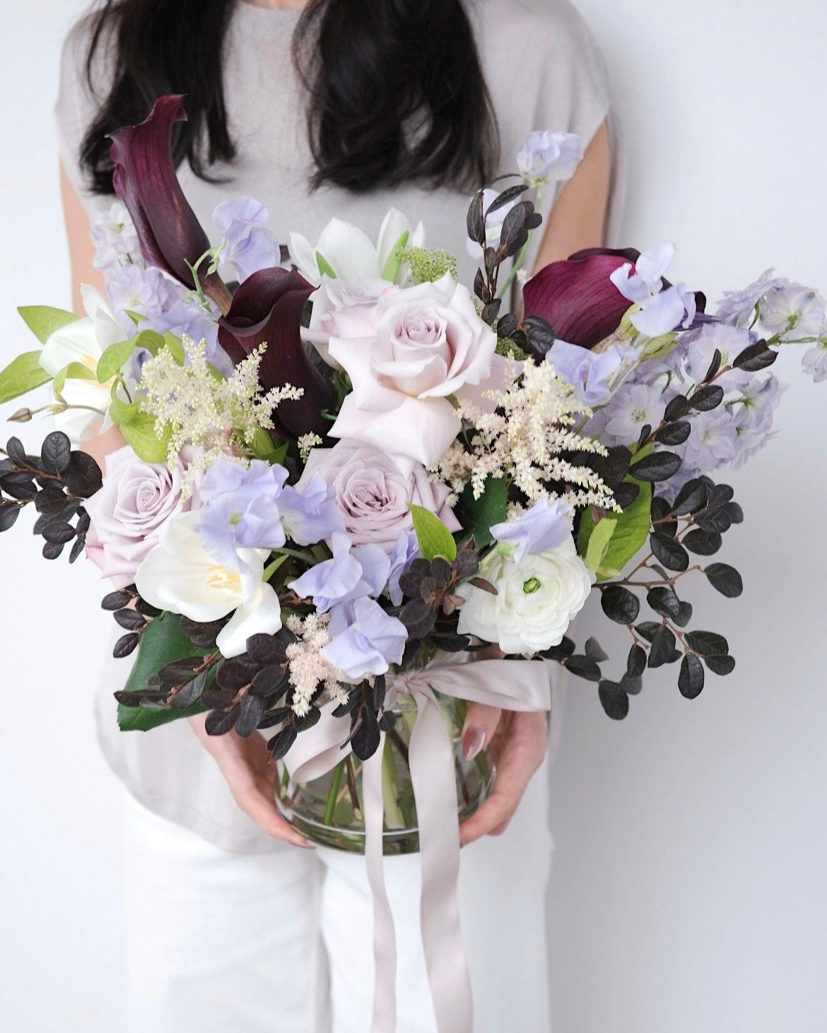 Romantic English garden inspired vase arrangement with roses and calla lilies by Studio Inflorescence Singapore