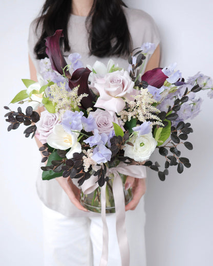 Romantic English garden inspired vase arrangement with roses and calla lilies by Studio Inflorescence Singapore